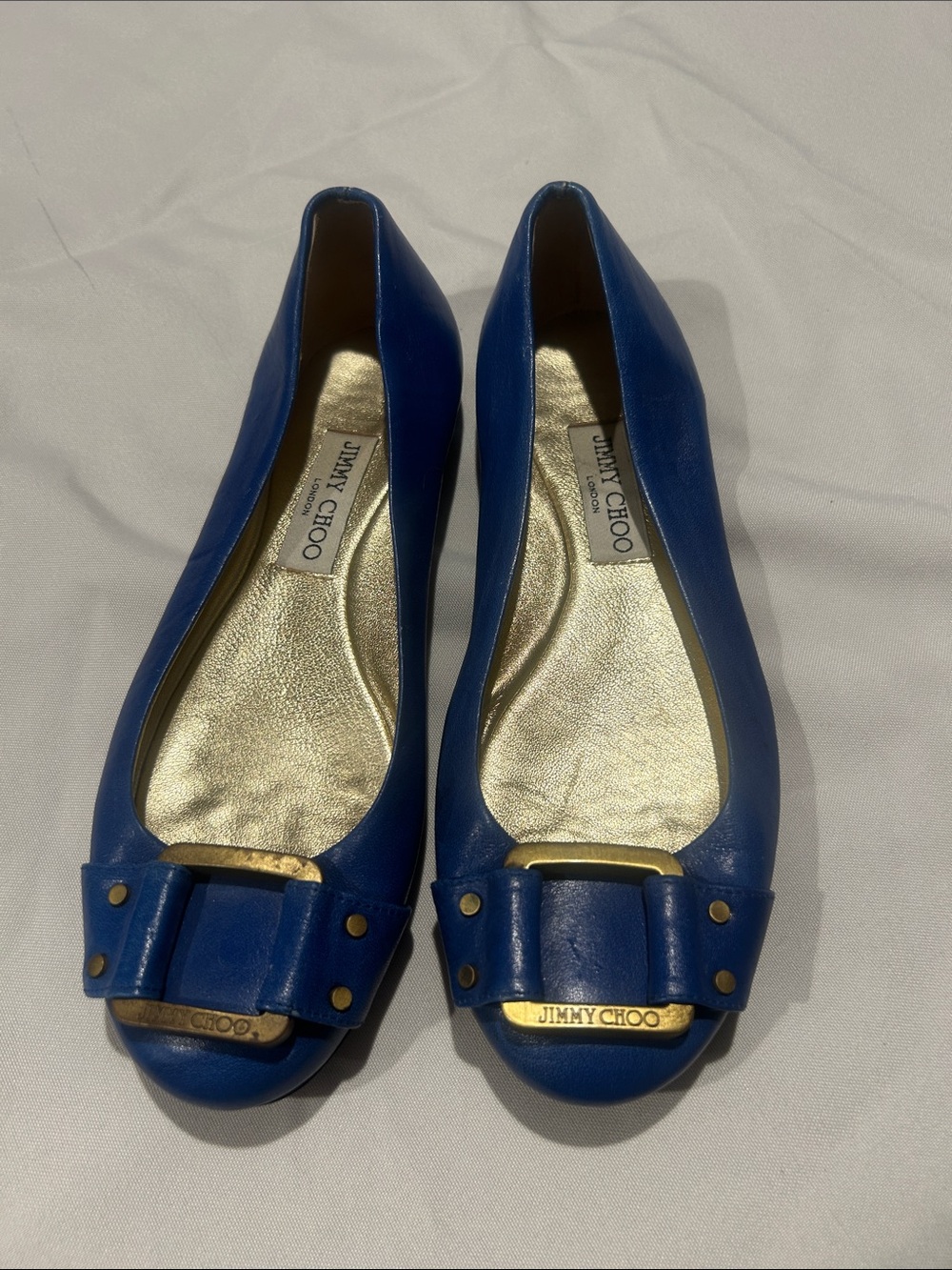 Jimmy Choo Cobalt Blue Leather Bow Flats with Gold Accents
